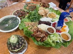 -沐毫傣泐云南菜孔雀宴•手抓饭傣味烧烤(曼听公园店)