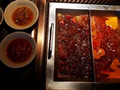 番茄麻辣锅-老牌坊云南鱼豆花火锅(哈西万达店)