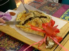 塔城酥皮面包烤羊腿-烟疆印象新疆菜(万联广场店)