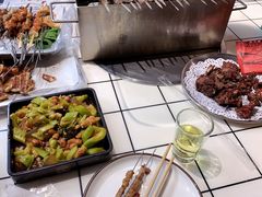 -喜悦小串丹东小黄牛海鲜烧烤大排档(民主广场店)