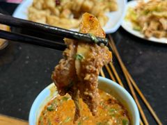 -明何记涮牛肚(品牌首店隋唐植物园南门古城路店)