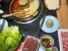 -明何记涮牛肚(品牌首店隋唐植物园南门古城路店)