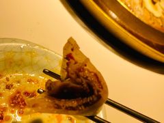 腌萝卜片-猪啊牛呀羊啊铜盘烤肉(正大广场店)