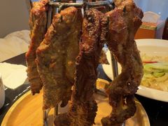 馕坑黄金烤肉-巴依老爷新疆美食(清华东门店)