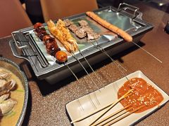 -曼听小寨海鲜烧烤·大连辣炒大王(盖州街店)