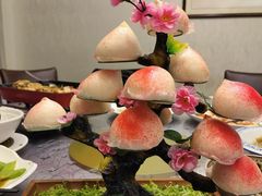 流心奶黄寿桃包-轩记海鲜餐厅·四十五年老字号·经典粤菜(西区彩虹店)