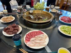 -周老三跷脚牛肉·全牛火锅(非遗传承店)
