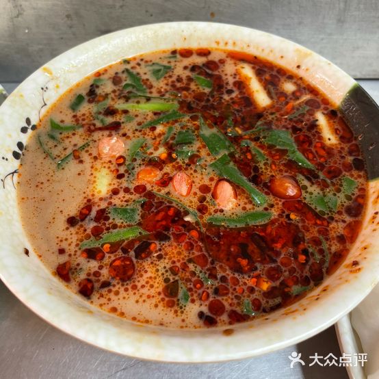 新安所杨大妈沾水卷粉
