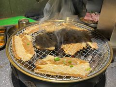 -草家酱蟹炭火烤肉店(珲春南路二店)