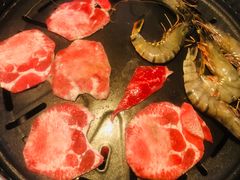 切薄片的牛舌-贺野·自助炭火烤肉(紫藤路店)