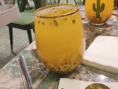 百香果菠萝汁-浩海火烧云傣家菜(京广店)