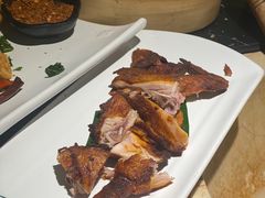 现烤脆皮春鸡-云海肴云南菜·蒸汽石锅鱼(青岛万象城店)
