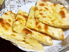 黄油馕饼-蓝孔雀美食(南岗店)