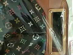 -京伟修鞋洗鞋奢侈品皮具护理店