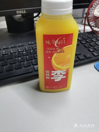 新年来一瓶味全每日C橙汁
