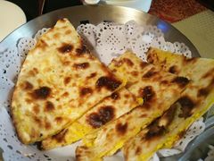 黄油馕饼-蓝孔雀美食(南岗店)