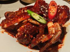 草家招牌酱辣蟹-草家酱蟹炭火烤肉店(珲春南路一店)