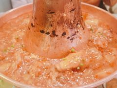 土司铜锅油焖鸡-浩海火烧云傣家菜(京广店)