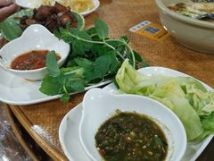 -沐毫傣泐云南菜孔雀宴•手抓饭傣味烧烤(曼听公园店)