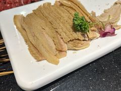 -明何记涮牛肚(品牌首店隋唐植物园南门古城路店)