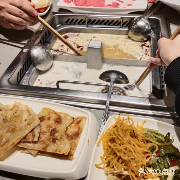 海底捞火锅(新华联梦想城店)葱味飞饼图片