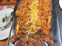 -明何记涮牛肚(品牌首店隋唐植物园南门古城路店)