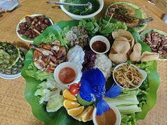 -沐毫傣泐云南菜孔雀宴•手抓饭傣味烧烤(曼听公园店)