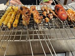 -喜悦小串丹东小黄牛海鲜烧烤大排档(民主广场店)