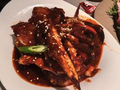 草家招牌酱辣蟹-草家酱蟹炭火烤肉店(珲春南路一店)