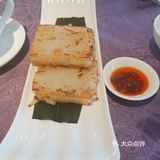 暖胃粥必点好像是墨鱼饼
