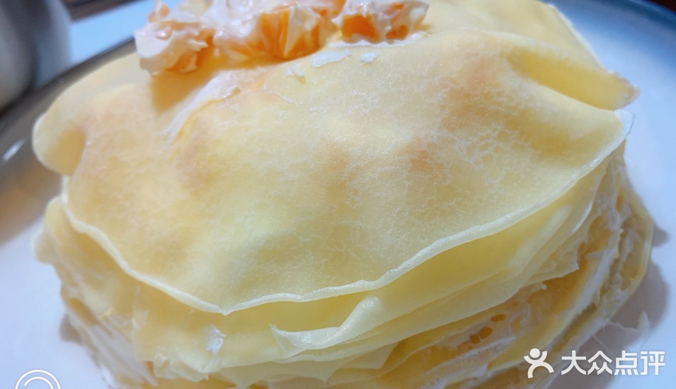 松松软软，伴着刚出炉的鸡蛋香气，太美好。手打花饼