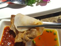 腌萝卜片-猪啊牛呀羊啊铜盘烤肉(正大广场店)