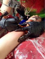 iphone_upload_pic-异族刺青创意工作室