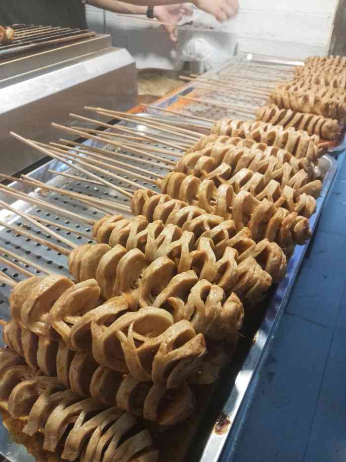 户部巷烤面筋(啦喜街)-"整条街有好几家卖烤面筋的,最喜欢这家的味.