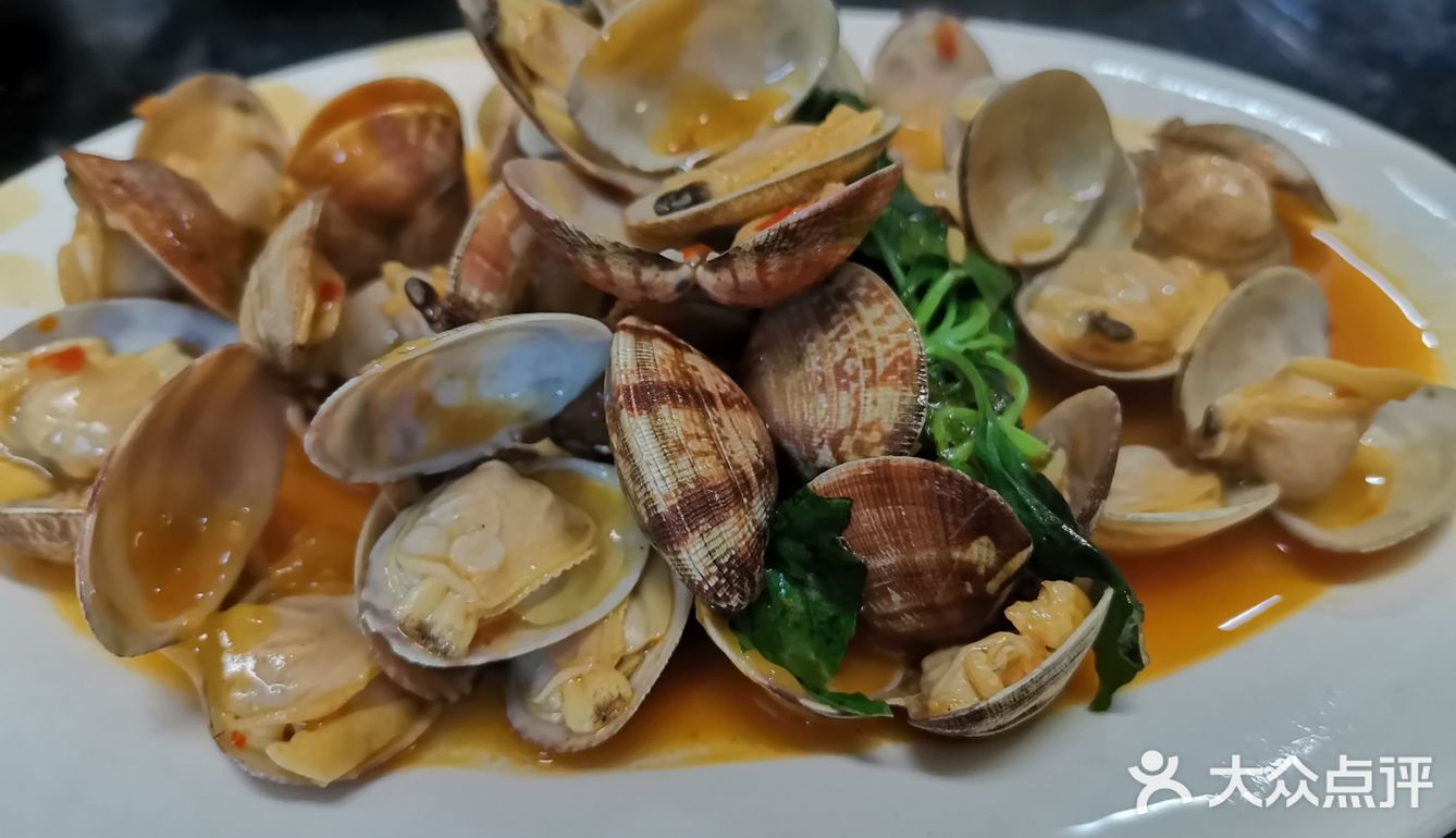店里还有特制酱料蘸粥里的海鲜
