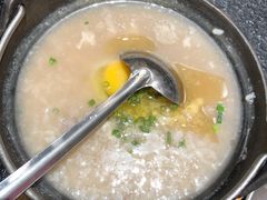 窝蛋牛肉粥-何妹湿辣牛肉·粤式烧烤砂煲(桂雅路店)