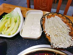 -明何记涮牛肚(品牌首店隋唐植物园南门古城路店)