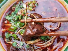 -拈签一笑黄牛肉辣卤串串