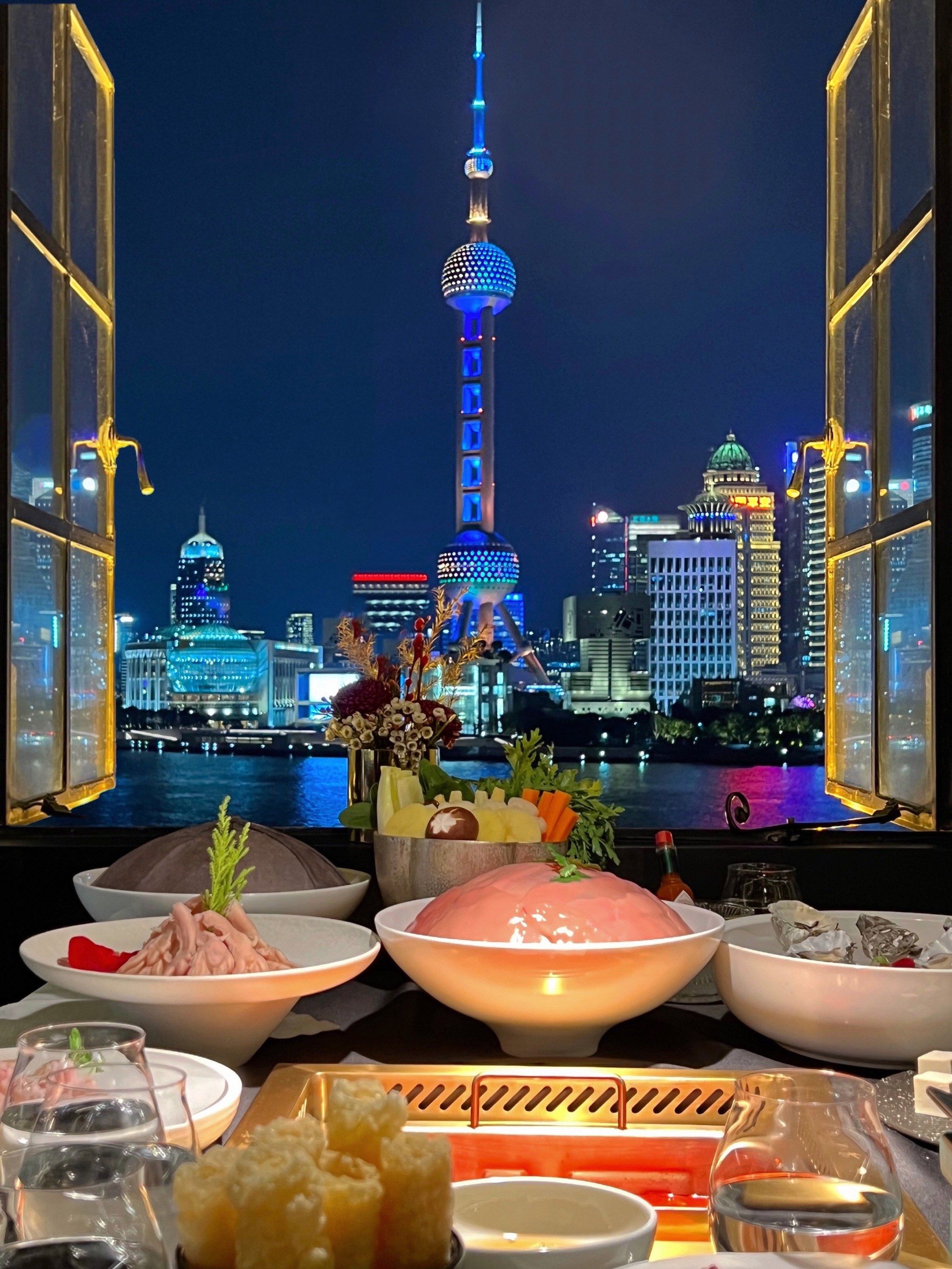 心甘情愿为这窗外江景买单?