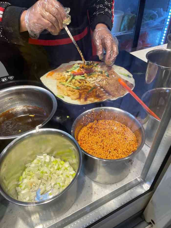 一姐卷饼王-"每天进步一点点09写点评鸭[调皮]团购.