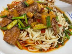 现炒酸辣猪肝面-李与白包子铺(桐梓林店)