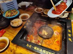 -老牌坊云南鱼豆花火锅(哈西万达店)