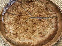 馕坑芝麻馕-巴扎美食·新疆菜·西域歌舞表演餐厅(新疆大厦店)