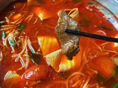 -黄利砖万峰林布依特色酸笋牛肉馆