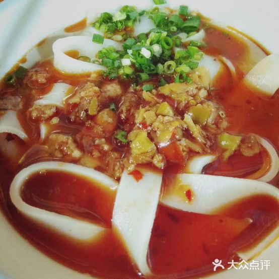 李明英干米皮店