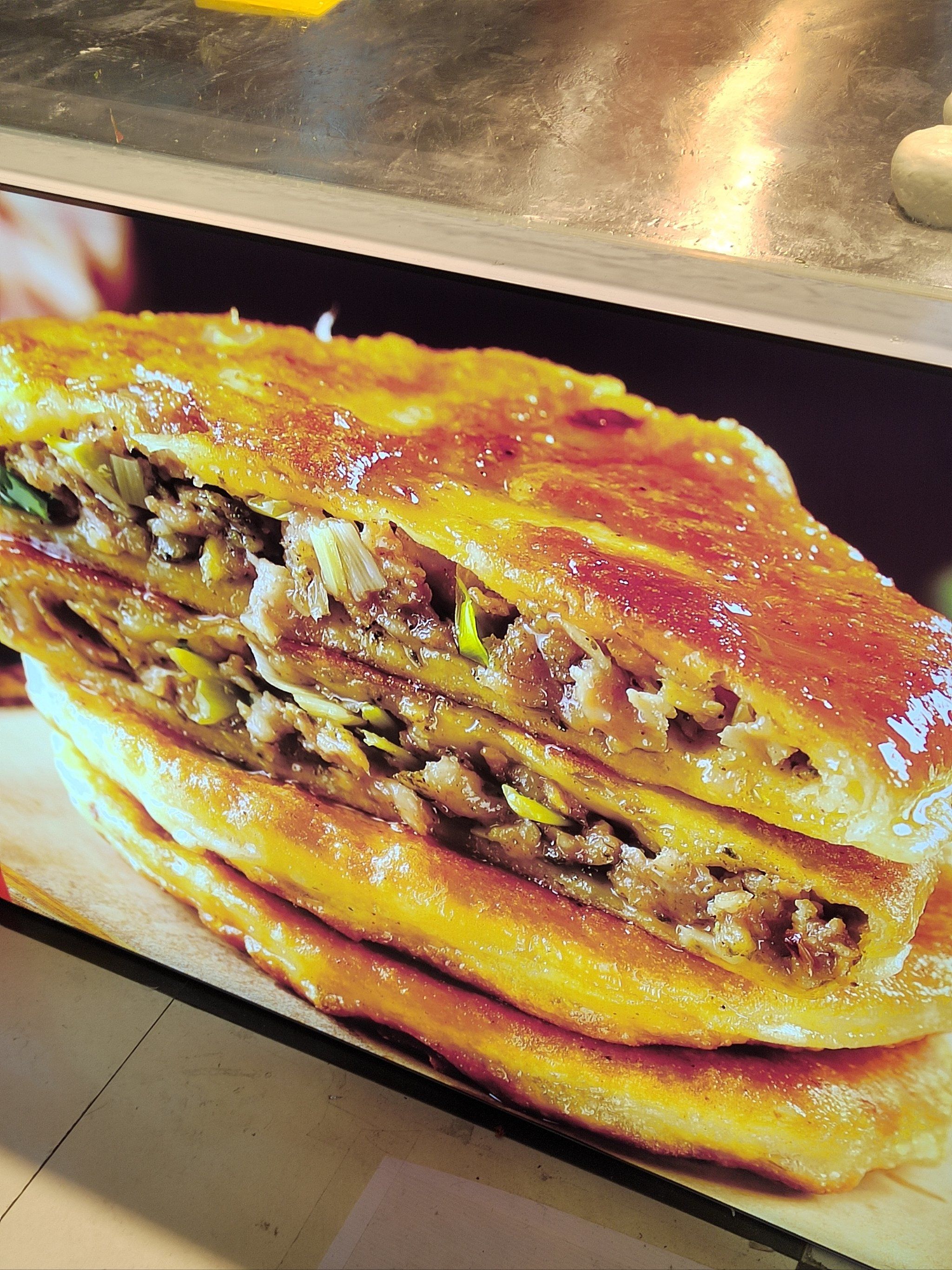 0元玩转这座城一个鲜肉饼里面有一两肉