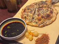 酥皮羊肉烤包子-那拉提之疆·新疆菜(美院店)