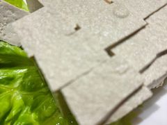 -明何记涮牛肚(品牌首店隋唐植物园南门古城路店)