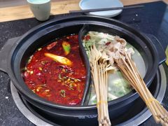 -明何记涮牛肚(品牌首店隋唐植物园南门古城路店)