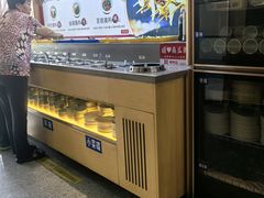 -明何记涮牛肚(品牌首店隋唐植物园南门古城路店)